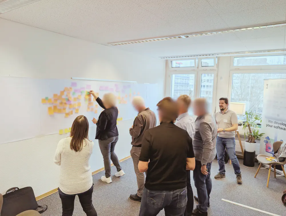 Software, die deine Domäne spricht. Logo